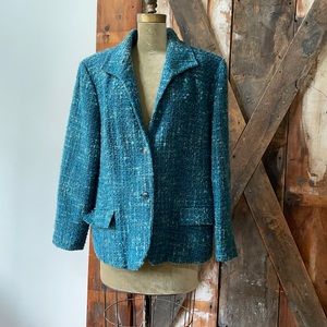tweed jacket of blues and a touch of green